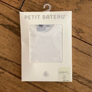 Set of 2 sleeveless bodysuits, 18m